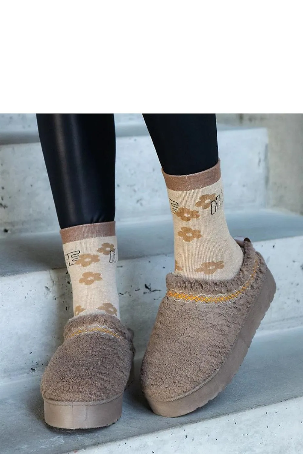 Brown snow boots with a low shaft